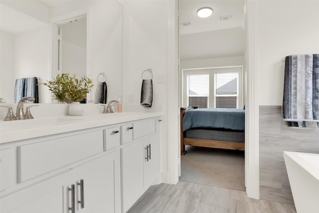 3728 Cherry Hills Dr, Sherman, TX 75090 - ensuite bathroom featuring a freestanding tub and double vanity