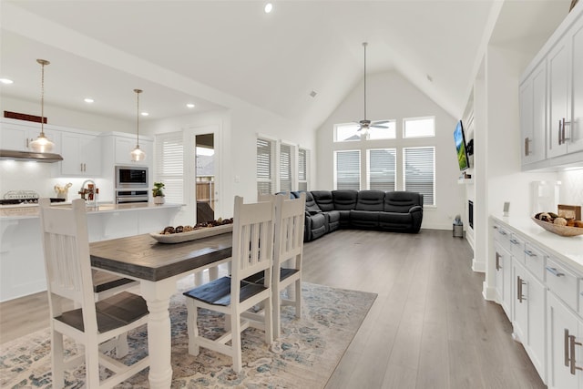 3728 Cherry Hills Dr, Sherman, TX 75090 - dining space featuring light wood finished floors, a ceiling fan, recessed lighting, and high vaulted ceiling