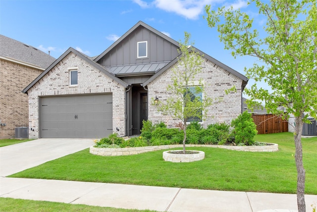 3728 Cherry Hills Dr, Sherman, TX 75090 - view of front of home with board and batten siding, central air condition unit, concrete driveway, brick siding, and a garage