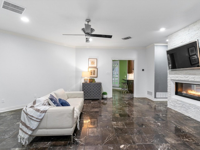 9120 Timber Oaks Dr, Fort Worth, TX 76179 - living area featuring ornamental molding, a ceiling fan, a stone fireplace, marble tiled flooring, and baseboards