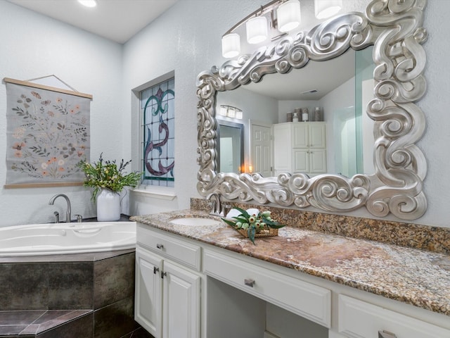 9120 Timber Oaks Dr, Fort Worth, TX 76179 - full bathroom with vanity and a garden tub