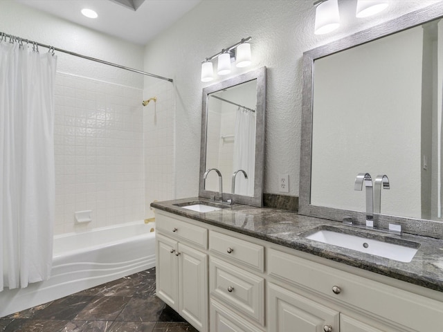 9120 Timber Oaks Dr, Fort Worth, TX 76179 - full bathroom featuring double vanity, shower / bath combo, and a textured wall