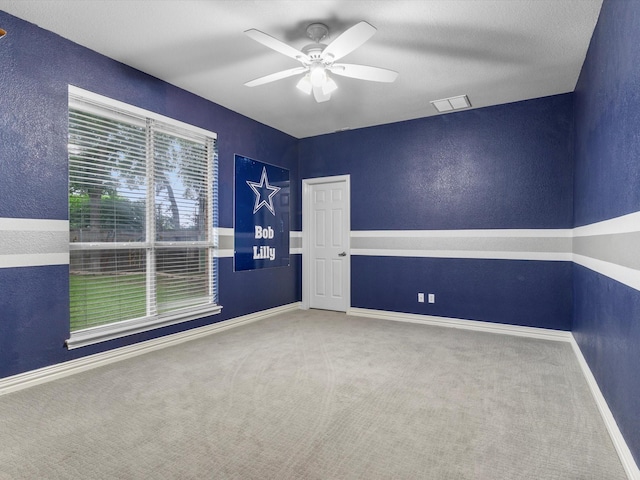 9120 Timber Oaks Dr, Fort Worth, TX 76179 - unfurnished room featuring carpet, ceiling fan, baseboards, and a textured wall