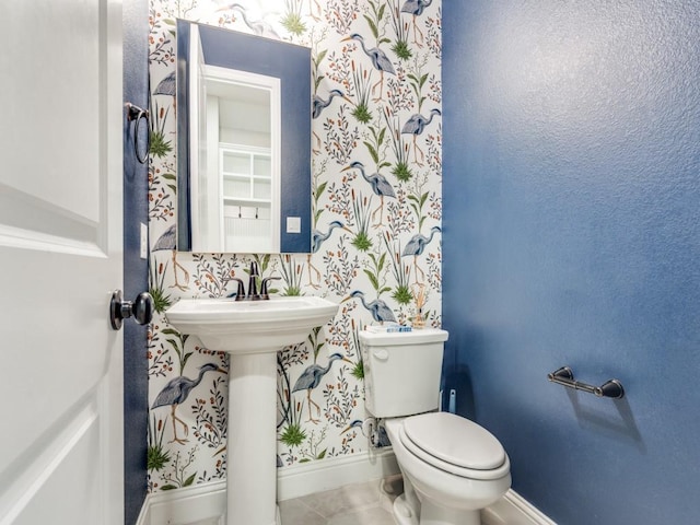 8542 Gerbera Daisy Rd, Frisco, TX 75035 - bathroom with wallpapered walls and tile patterned flooring