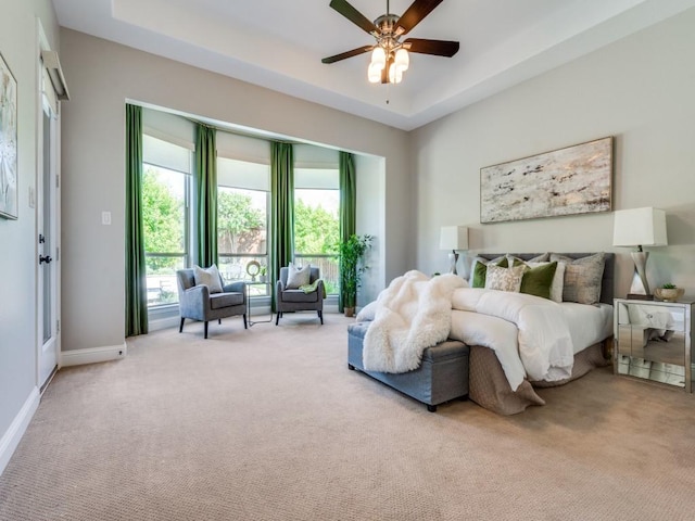 8542 Gerbera Daisy Rd, Frisco, TX 75035 - bedroom featuring carpet floors, a raised ceiling, and a ceiling fan