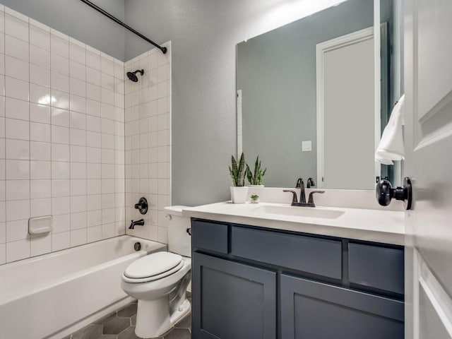 8542 Gerbera Daisy Rd, Frisco, TX 75035 - full bathroom featuring vanity, tub / shower combination, a textured wall, and tile patterned floors