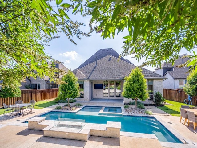 8542 Gerbera Daisy Rd, Frisco, TX 75035 - view of swimming pool with a patio area, a fenced backyard, and a pool with connected hot tub