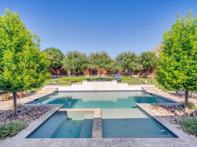 8542 Gerbera Daisy Rd, Frisco, TX 75035 - view of swimming pool featuring a pool with connected hot tub