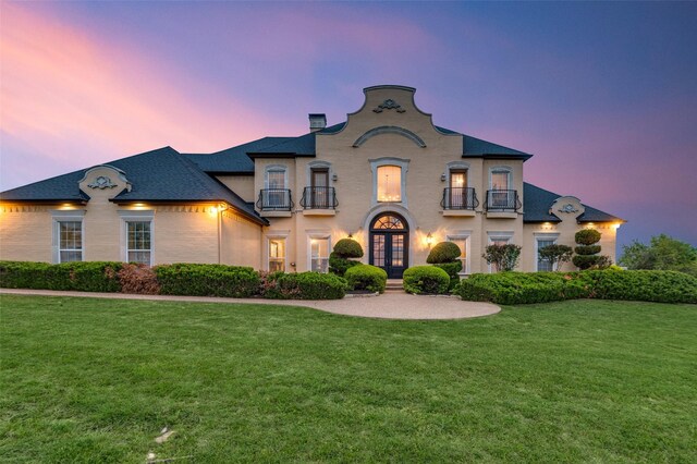 253 Bayne Rd, Haslet, TX 76052 - view of front of property with french doors, a balcony, a lawn, and a chimney