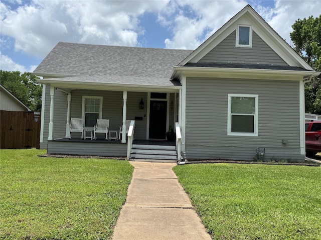 819 Beech St, Bonham, TX 75418 - view of front of house featuring covered porch and roof with shingles