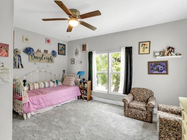 401 S 2nd St, Wortham, TX 76693 - bedroom with carpet and ceiling fan