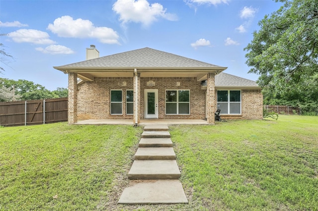8109 County Road 804, Burleson, TX 76028 - rear view of property with a patio area, brick siding, a chimney, and roof with shingles