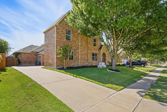 4304 Wildbriar Ln, Mansfield, TX 76063 - view of side of home with brick siding and concrete driveway