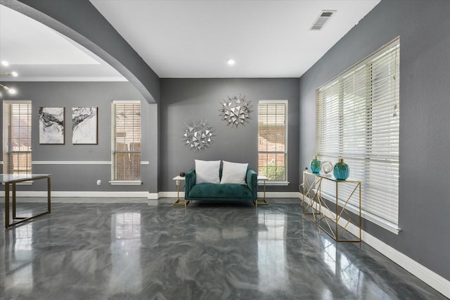 4304 Wildbriar Ln, Mansfield, TX 76063 - sitting room featuring arched walkways, baseboards, and ornamental molding