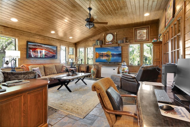 161 Cheyenne Dr, Nocona, TX 76255 - living area featuring wooden ceiling, stone tile flooring, healthy amount of natural light, lofted ceiling, and a ceiling fan