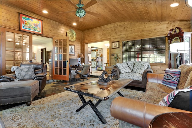 161 Cheyenne Dr, Nocona, TX 76255 - living area featuring lofted ceiling, wooden walls, wooden ceiling, ceiling fan, and stone tile flooring
