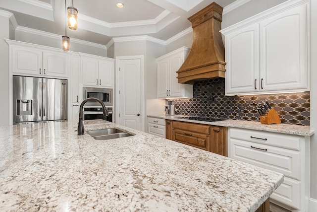 3011 Skyhawk Dr, Granbury, TX 76049 - kitchen with stainless steel appliances, a sink, premium range hood, white cabinetry, and recessed lighting