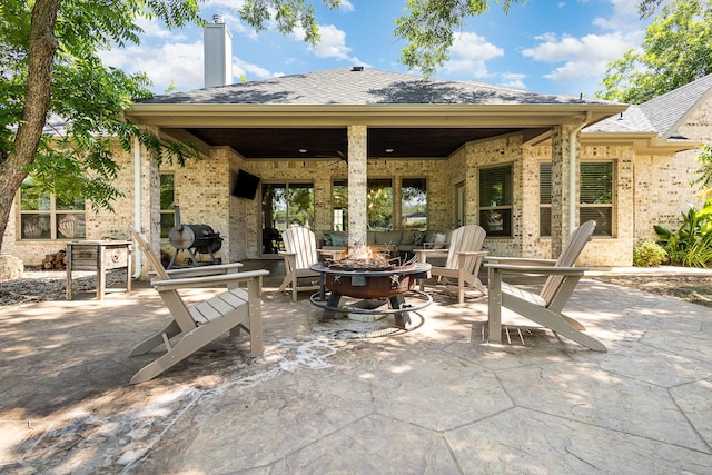 3011 Skyhawk Dr, Granbury, TX 76049 - view of patio featuring an outdoor fire pit and area for grilling
