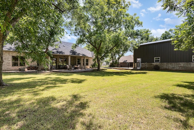 3011 Skyhawk Dr, Granbury, TX 76049 - view of grassy yard with a patio