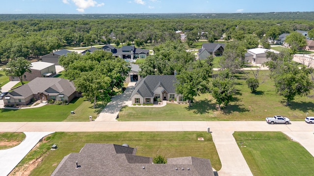 3011 Skyhawk Dr, Granbury, TX 76049 - aerial perspective of suburban area featuring a heavily wooded area