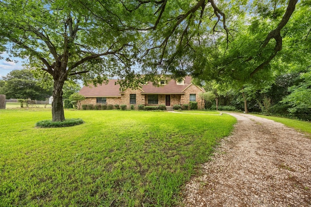 410 S Walnut Grove Rd, Midlothian, TX 76065 - view of front of home featuring a front lawn and brick siding