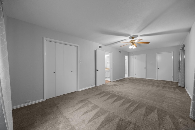 410 S Walnut Grove Rd, Midlothian, TX 76065 - unfurnished bedroom with carpet flooring, baseboards, a ceiling fan, and connected bathroom