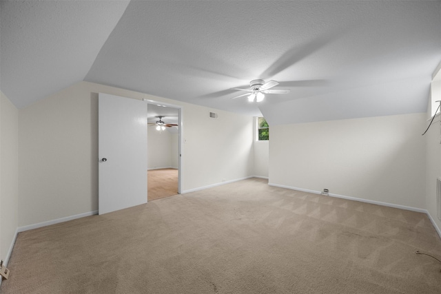410 S Walnut Grove Rd, Midlothian, TX 76065 - additional living space featuring ceiling fan, light colored carpet, vaulted ceiling, and baseboards