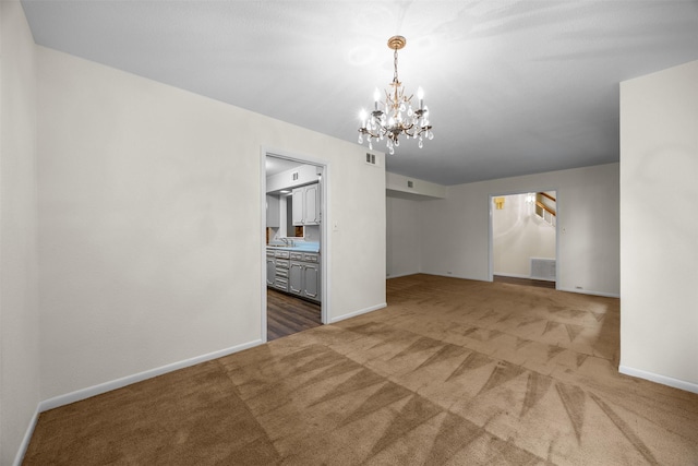 410 S Walnut Grove Rd, Midlothian, TX 76065 - carpeted empty room with a chandelier and baseboards