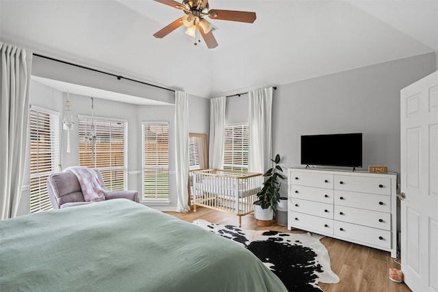 405 High Desert Dr, Fort Worth, TX 76131 - bedroom with vaulted ceiling, wood finished floors, and a ceiling fan