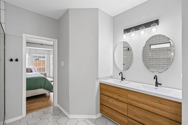 405 High Desert Dr, Fort Worth, TX 76131 - bathroom with ensuite bathroom, double vanity, and tile patterned flooring