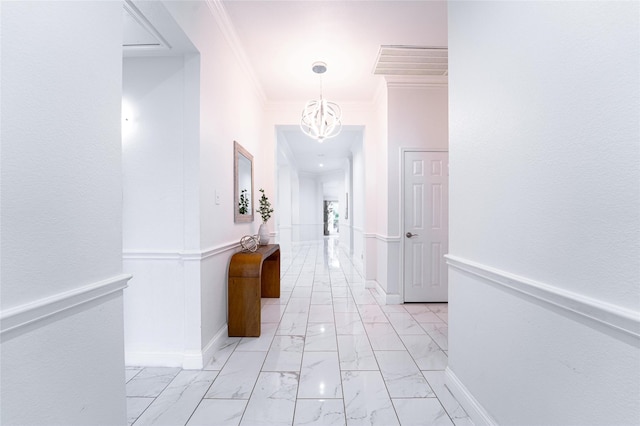 1311 Heather Brook Dr, Allen, TX 75002 - hall with ornamental molding, light marble finish flooring, and a chandelier