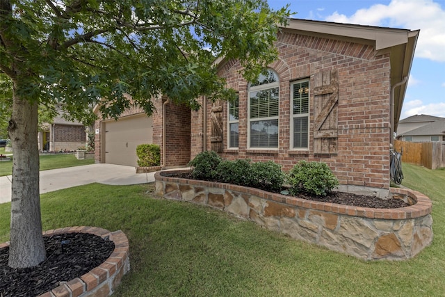 14612 Mainstay Way, Fort Worth, TX 76052 - view of front facade featuring brick siding, concrete driveway, and a garage