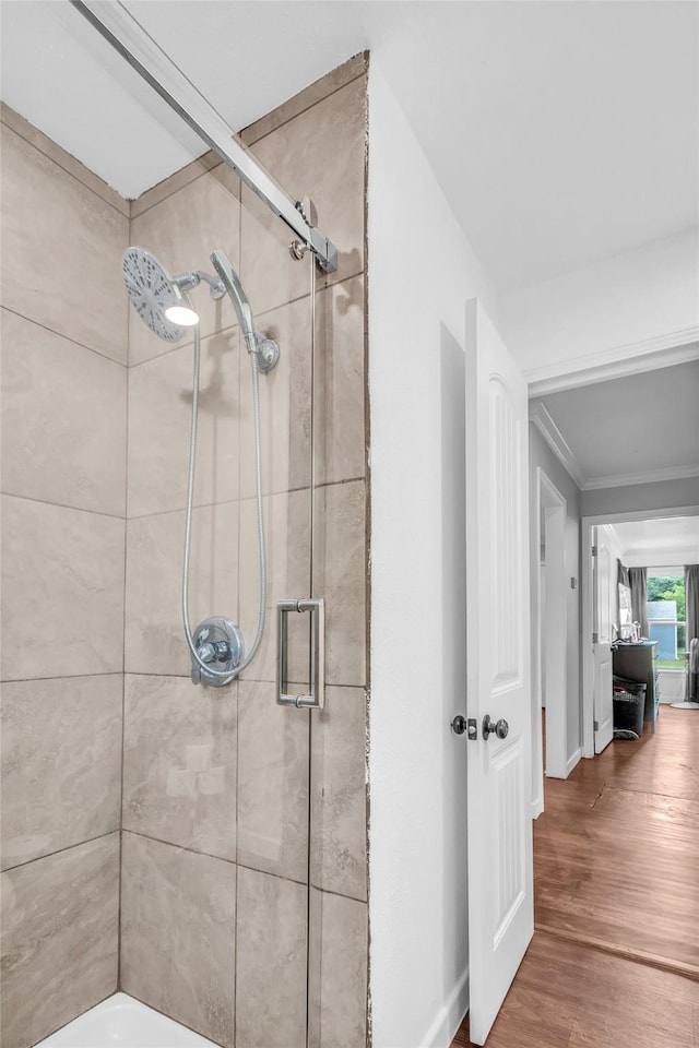 312 Dean St, Athens, TX 75751 - full bathroom featuring crown molding, baseboards, and wood finished floors