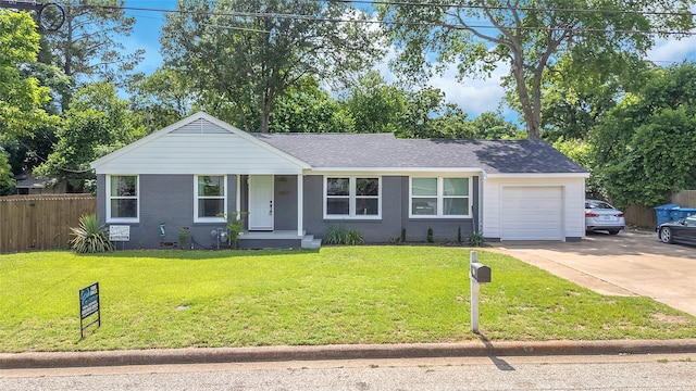 312 Dean St, Athens, TX 75751 - ranch-style home with a garage, concrete driveway, a shingled roof, and brick siding