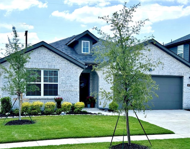 608 N Rain Barrel Pl, Weston, TX 75009 - french provincial home featuring a garage, concrete driveway, and a front yard