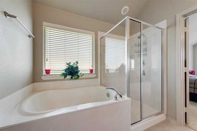 1322 Turnbridge Dr, Glenn Heights, TX 75154 - full bathroom featuring a stall shower, a bath, and a textured wall