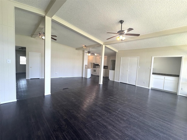 104 W Cayuga Dr, Athens, TX 75751 - unfurnished living room featuring a ceiling fan, a textured ceiling, and wood finished floors