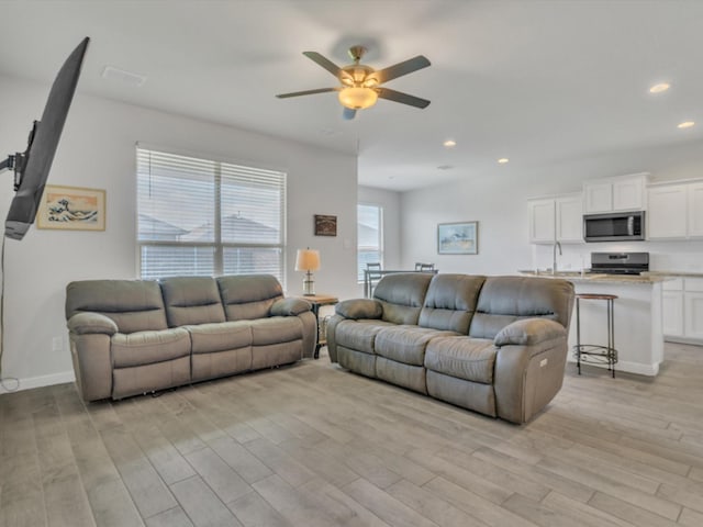 133 Hollytree Ln, Boyd, TX 76023 - living room with ceiling fan, light wood-style flooring, and recessed lighting