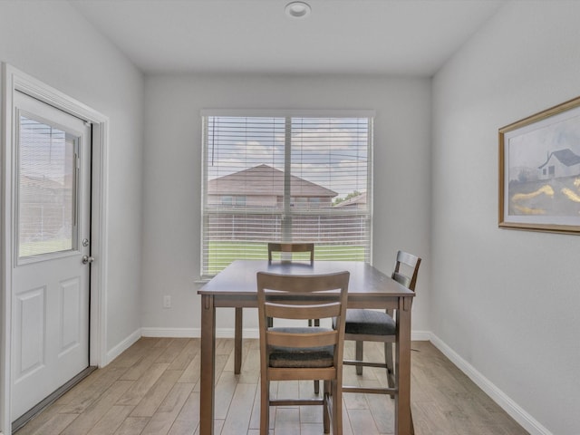 133 Hollytree Ln, Boyd, TX 76023 - dining area featuring light wood-style flooring and baseboards