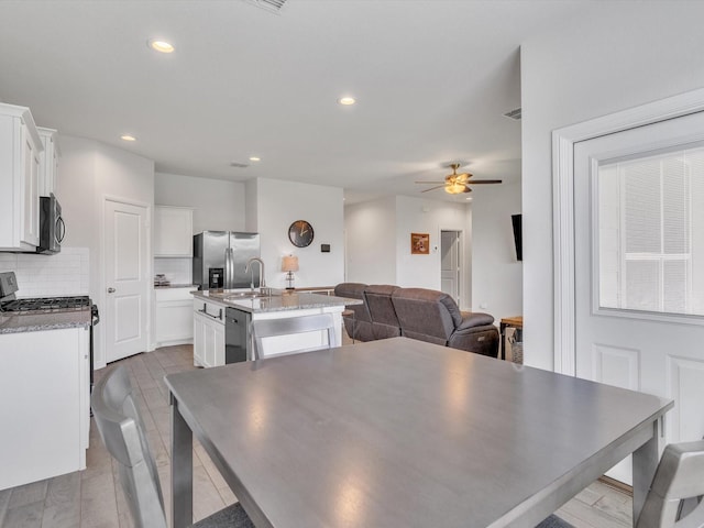 133 Hollytree Ln, Boyd, TX 76023 - dining space with a ceiling fan and recessed lighting