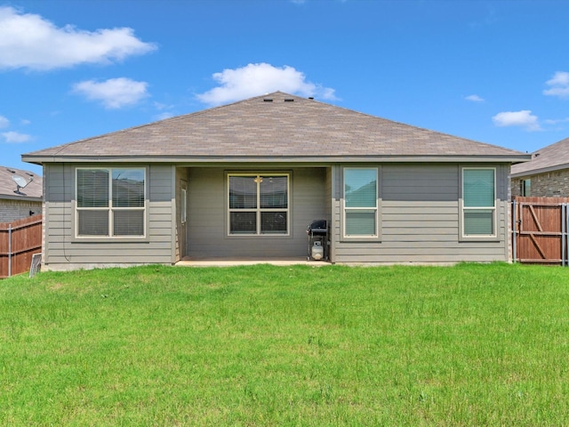 133 Hollytree Ln, Boyd, TX 76023 - rear view of property featuring a shingled roof and a patio