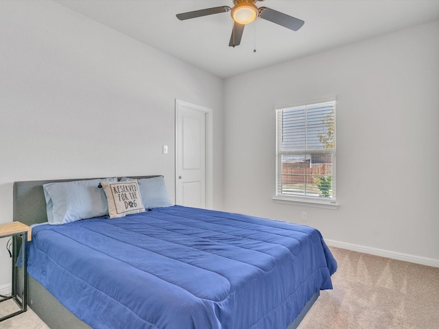 133 Hollytree Ln, Boyd, TX 76023 - carpeted bedroom featuring baseboards and a ceiling fan