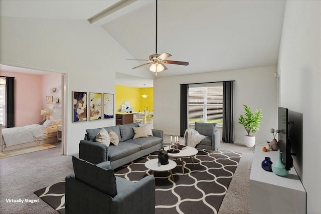 1310 Shumard Dr, Princeton, TX 75407 - carpeted living area featuring beamed ceiling, a ceiling fan, and high vaulted ceiling