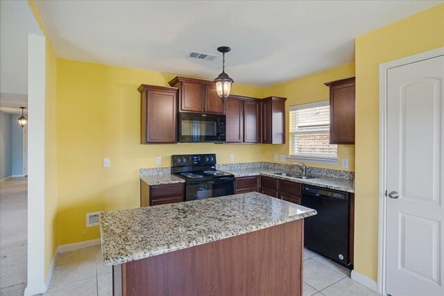 1310 Shumard Dr, Princeton, TX 75407 - kitchen with black appliances, a sink, light stone countertops, and light tile patterned flooring