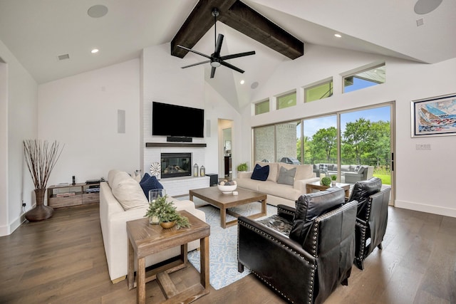 13445 Meadow Cross Dr, Fort Worth, TX 76008 - living room with a ceiling fan, beamed ceiling, wood finished floors, a brick fireplace, and recessed lighting