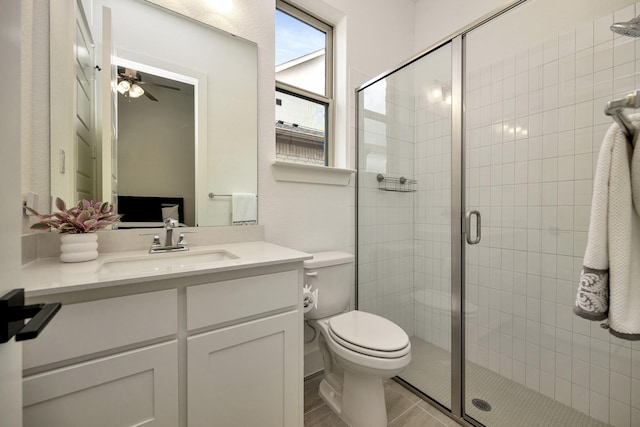 13445 Meadow Cross Dr, Fort Worth, TX 76008 - bathroom featuring vanity, a stall shower, and ceiling fan