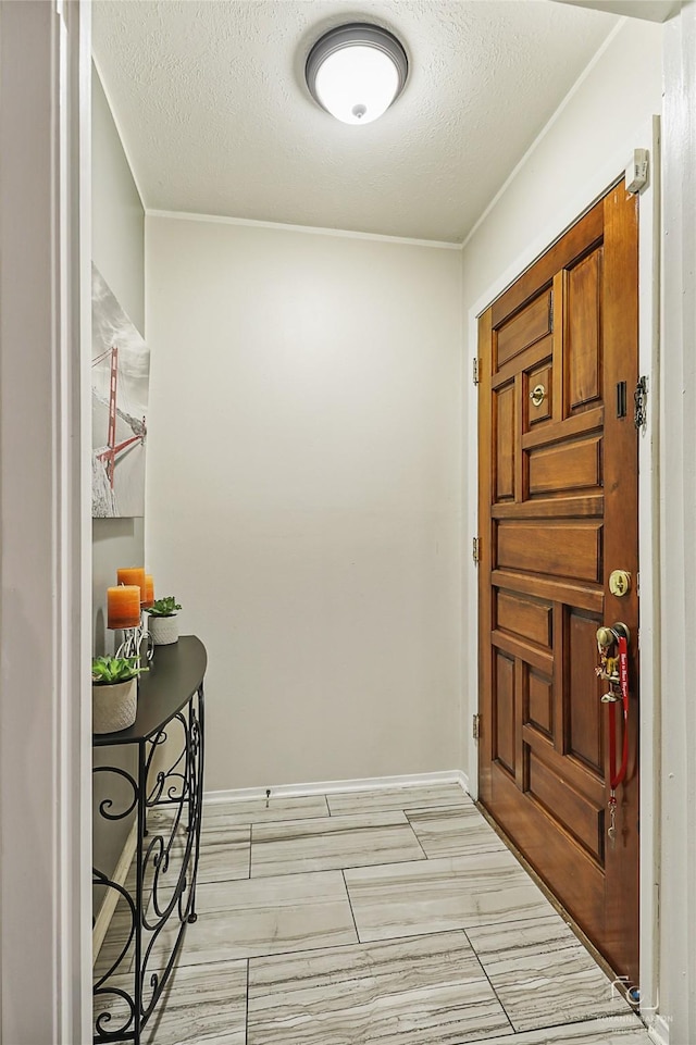 2825 Warren Ave, Dallas, TX 75215 - entryway featuring a textured ceiling and wood finish floors