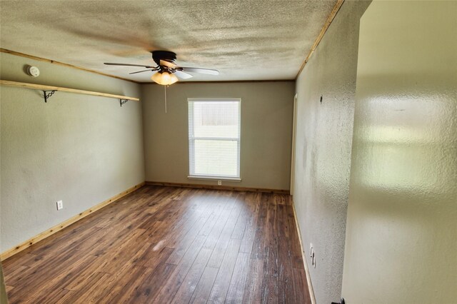 1214 Vivienne St, Weatherford, TX 76086 - empty room with a ceiling fan, a textured ceiling, hardwood / wood-style floors, baseboards, and a textured wall