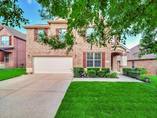 3321 Glen Crest Ln, Denton, TX 76208 - view of front of house with driveway, a garage, a front lawn, and brick siding