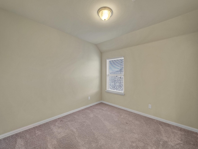 3321 Glen Crest Ln, Denton, TX 76208 - empty room with carpet flooring, baseboards, and lofted ceiling